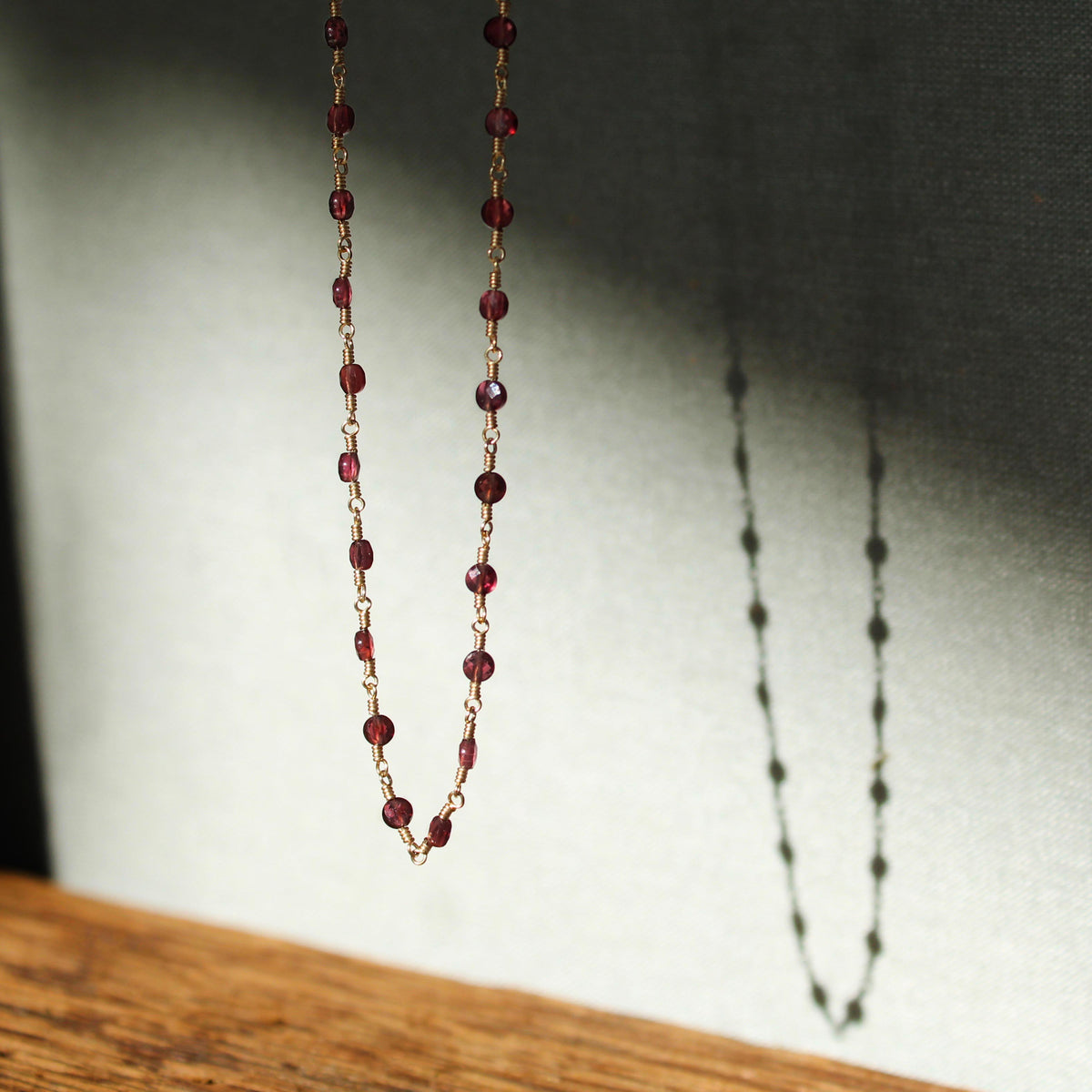 Sacred Strand Red Garnet Coin