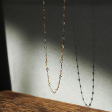 Load image into Gallery viewer, Sacred Strand Crystal Quartz Coin
